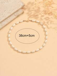 1 Stück handgemachte Halskette mit weißer Türkis-Perlen und Schlüsselbein-Kette, modischer goldener CCB-Schmuck für Frauen, geeignet für Urlaub und Strandmode. Das Blumenmuster auf der Oberfläche des weißen Türkis ist zufällig und nicht fest.