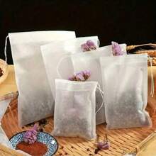 100 pièces de sacs non tissés à cordon de serrage. Sacs pratiques de filtration pour les sachets de thé, la séparation des décoctions de médecine chinoise et des saumures. Sacs non tissés jetables à cordon de serrage.