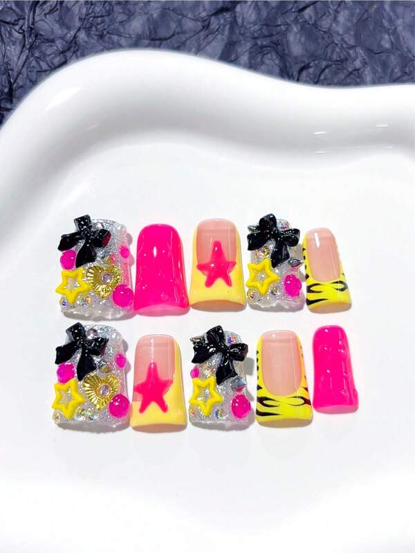 10 peças de unhas postiças artesanais Y2K Duckbill, com laço preto, decoração de diamante em forma de estrela colorida, rosa brilhante, traço francês amarelo; suprimentos para unhas, unhas caseiras, unhas postiças de acrílico DIY; adequadas para feriados, festas, uso diário; inclui 1 folha de cola gelatinosa e 1 mini lixa