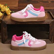 1 par de zapatos deportivos ligeros de estilo universitario asimétrico/asimétrico de tela con diseño de dibujos animados, adecuados para la universidad, vacaciones y todas las temporadas
