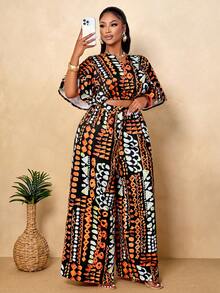 BIUBIU Bộ đồ nữ cỡ lớn, kiểu dáng thường ngày, gợi cảm, thanh lịch, họa tiết nhiệt đới châu Phi màu đen, áo cổ chữ V và quần ống rộng (họa tiết ngẫu nhiên) mùa hè. - Màu cam đậm - Xem 6