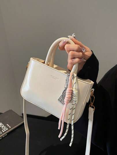 حقيبة يد جديدة بتصميم كلاسيكي بطبعة الجوكر وبلون أحادي من قماش بي يو مقاوم للماء، مع تصميم زخرفي بالحروف، وحقيبة كتف بتصميم زخرفي معلق، مناسبة للسفر والتسوق والحفلات والمواعيد