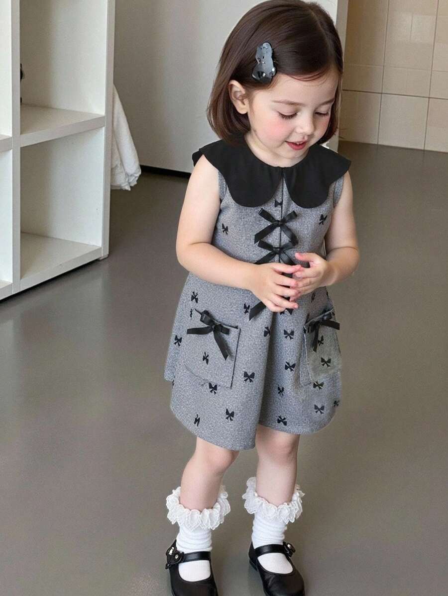 女童幼儿时尚可爱领口无袖蝴蝶结花卉印花连体裤