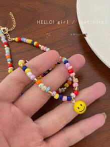 Collana con ciondolo a faccia sorridente in perline, collana da uomo minimalista e colorata, collana stile retrò elegante