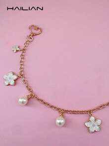 HAILIAN 这款包包挂饰或链条以美丽的樱花为主题，饰有圆形珍珠和可爱的樱花图案。它可以用来装饰包包，作为包包挂饰，或作为生日/节日礼物。 - 白色 - 查看 3
