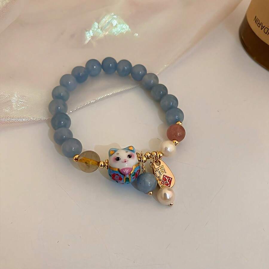 Bohemian Style Cute Ladies' Bracelet With Blue Stone Beads, Ceramic Cat Pendant, And Gold Accents - Lightweight And Durable Wristband Suitable For Casual Wear - Mèo may mắn - Xem 1