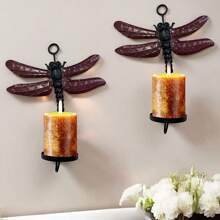 Set de 2 portavelas de pared con diseño de libélula, capaz de sostener velas con un diámetro máximo de 2.25"
