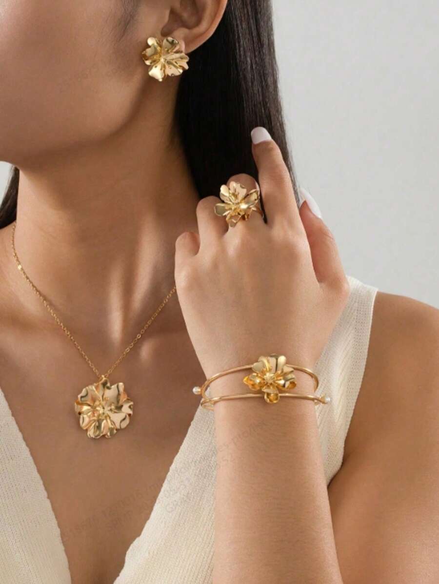 1 Set de pulsera, anillo, collar y aretes con flores superpuestas