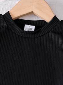 2pcs/Set Girls Black Round Neck Knit Long Sleeve Top + Ditsy Floral Skirt Outfit, Spring/Autumn, Girls Long Sleeve Casual Set, Solid Color Fashion Soft Comfortable Clothing, Young Lady Top And Mini Skirt Two Pieces Suit, Suitable For Outdoor, Daily, Leisure Wear - 黑色 - 查看 3