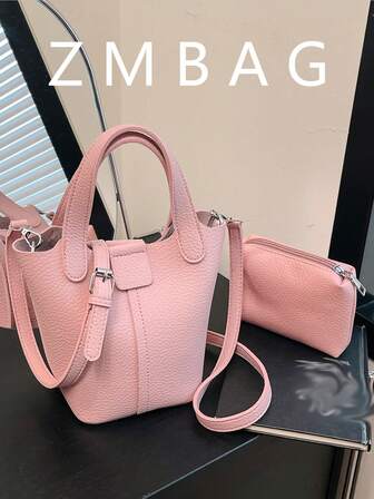 Koreansk version handhållen grönsakskorgväska för kvinnor, ny trendig litchi-mönstrad hinkväska, mångsidig axelväska, ny hinkväska, handväska i äkta läder för kvinnor, exklusiv känsla, stor kapacitet, topplager av kohud, mångsidig grönsakskorgväska för kvinnor