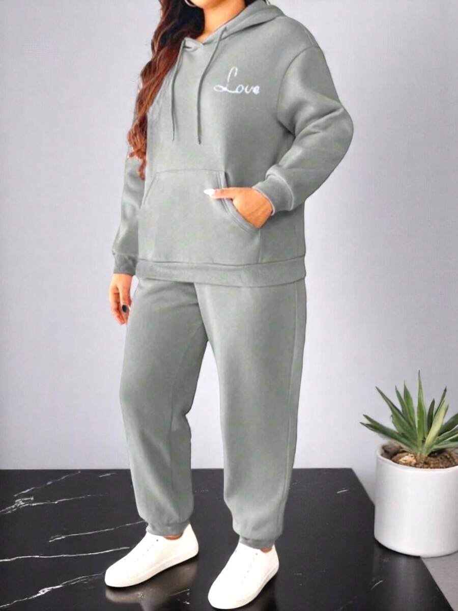 Conjunto deportivo informal de talla grande para mujer, chaqueta con capucha, hombros caídos, manga larga, cremallera y bolsillos, pantalones largos con cordón a juego. - Gris - Ver 1