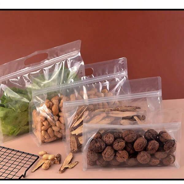 15/10 قطعة [سميكة ومقاومة للرطوبة] أكياس يدوية محكمة الإغلاق - أكياس تخزين محكمة الإغلاق، مقاومة للماء ومانعة للتسرب. تتميز بإغلاق كامل بسوستة، أكياس مزودة بسوستة، تصميم قائم بذاته، أكياس تخزين للثلاجة والمطبخ. مثالية للسفر والتعبئة والاستخدام المنزلي. مثالية لتخزين الوجبات الخفيفة والمكسرات والبذور والحلويات وأوراق الشاي والنودلز والحبوب والفطر وغيرها.