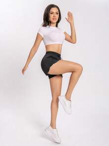 1 pieza Pantalón corto de yoga 2 en 1 para mujer con tela de secado rápido y bolsillos de malla - Para uso casual, entrenamiento en el gimnasio - Apto para verano - Para mujeres - Perfecto para un estilo de vida activo - Negro - Ver 3