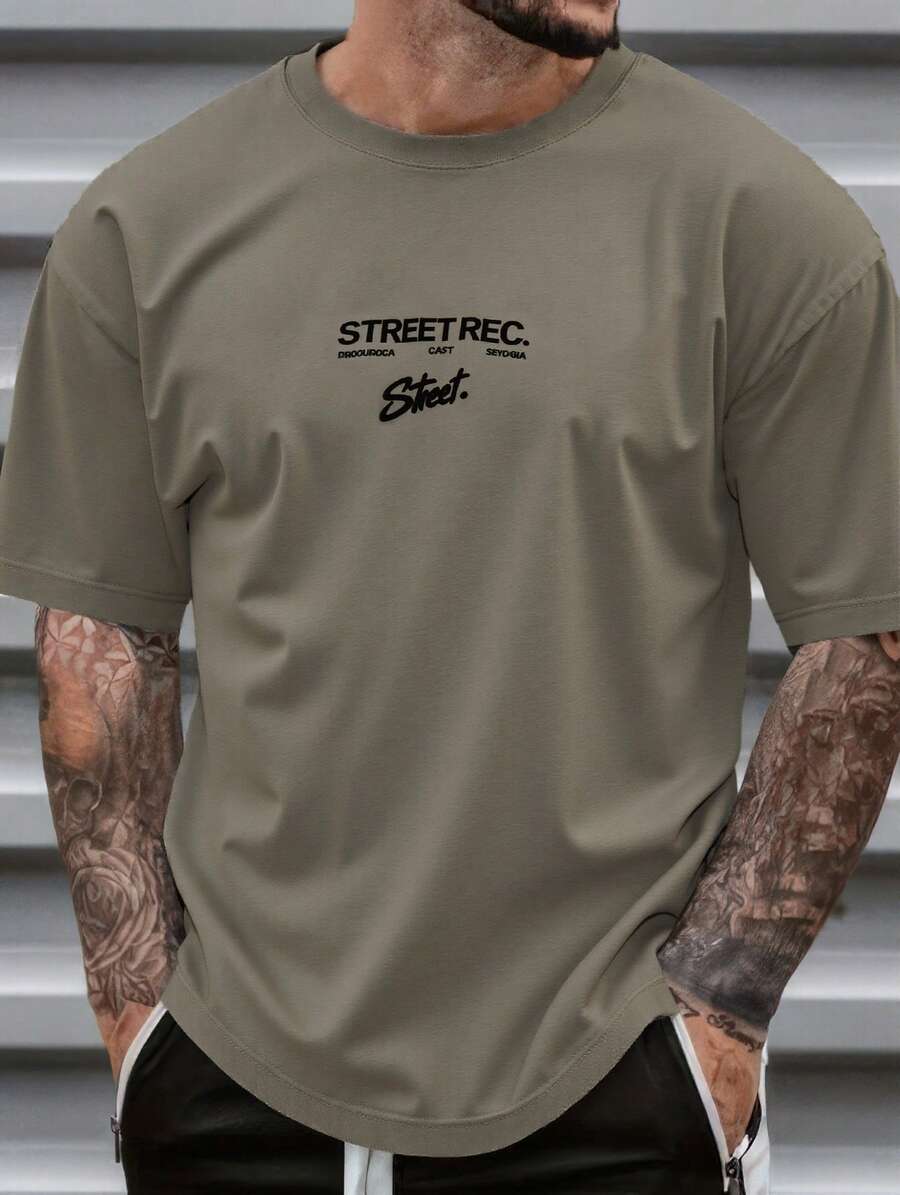 Playera Oversize de Hombre con Estampado Frontal y Diseño Gráfico en Espalda, Estilo Streetwear Urbano, Cuello Redondo, Manga Corta, Casual Moderna para Outfit Diario o Looks Juveniles  Verano    Regular - Café integral - Ver 1