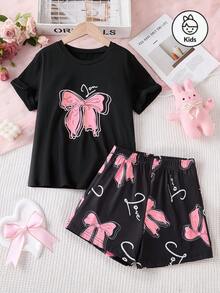 Conjunto de 2 piezas de ropa de estar en casa para niñas de moda, con Top de manga corta negra cuello redondo con estampado rosa de lazo, a juego con pantalones cortos o pantalones completos con estampado rosa de lazo, adecuado para uso casual en casa en verano - Negro - Ver 1