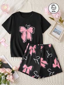 Conjunto de 2 piezas de ropa de estar en casa para niñas de moda, con Top de manga corta negra cuello redondo con estampado rosa de lazo, a juego con pantalones cortos o pantalones completos con estampado rosa de lazo, adecuado para uso casual en casa en verano - Negro - Ver 2