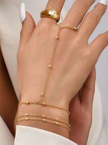 Conjunto de pulsera y anillo con cadena de dedo de perlas falsas