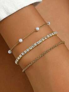 3 件优雅银色塑料水晶弹性手链套装，包括人造珍珠手链和不锈钢手链，尺寸可调，适合年轻女孩，是送给朋友、学生、生日的时尚珠宝礼物（注意：人造珍珠的数量可能略有不同） - 金色 - 查看 1