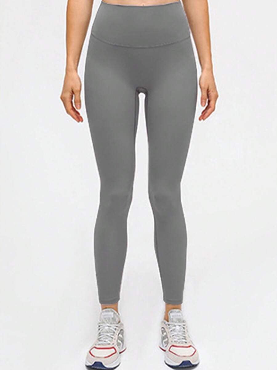 Pantalones largos de yoga para mujer, ideales para entrenamientos de fitness y yoga. Transpirables, cómodos y adecuados para uso diario fuera del gimnasio. Diseño sin apretar con tecnología de soporte y levantamiento glúteal. Pantalones de moldeo corporal perfectos para correr, hacer ejercicio o simplemente lucir un estilo deportivo moderno. - Gris - Ver 1