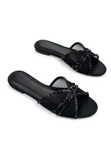 Sandales plates à brides femme élégantes, entièrement ornées de strass, avec décoration en maille ajourée noire. Bout rond confortable, convient pour le port quotidien et les soirées