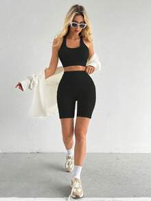 Büsten-verstärkender Bustier & hochgeschnittene formende Shorts, po-hebende Shorts, Campus Chic für Workouts und Straßenmode, Rückenfreies Trainings-Top mit konturierenden Shorts, nahtloser Übergang vom Studio in die Stadt, Brust-definierende Ausschnittpartie, hochgeschnittene Kompression, Rücken-akzentuierende Aussparungen, Workout-Bustier und Shorts, Damen Workout Zweiteiler - Schwarz - Übersicht 4