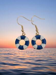 5 pares de pendientes con diseños inspirados en el mar: velero, ancla, salvavidas y faro