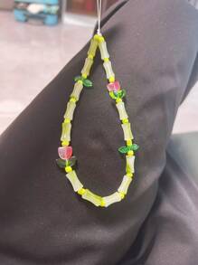 Stilvoller Bambus Tulpe Handyband mit Glasperlen - Traditionelles glückliches Accessoire mit grünen Perlen und Blumendekoration