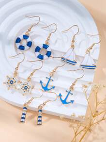 5 pares de pendientes con diseños inspirados en el mar: velero, ancla, salvavidas y faro