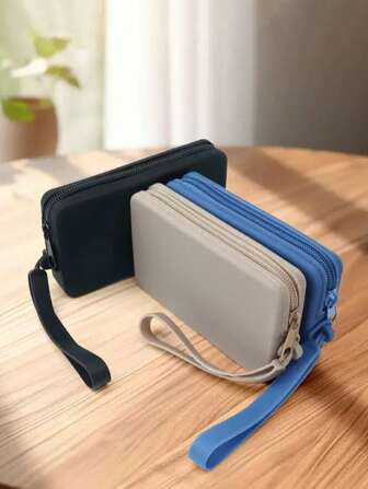 1 pezzo di borsa per cosmetici in silicone, portamonete raffinato, borsa per riporre oggetti, scatola per riporre oggetti da viaggio, borsa per dispositivi digitali, di piccole dimensioni ma con grande capacità, adatta per power bank e cavi dati. Facile da pulire, dotata di cordino per un trasporto comodo, piacevole da impugnare / texture morbida / design con ampia apertura / facile da estrarre e inserire / soffice e rimbalzante quando viene schiacciata / non si deforma se maneggiata liberamente.