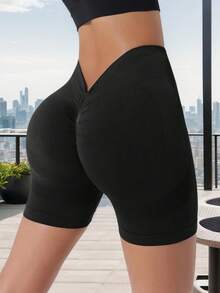 Pantalones cortos deportivos de color liso para mujer/sin costuras/cintura en V, shorts de yoga y gimnasio sexys que realzan el trasero - Negro - Ver 1