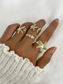 Set de 4 anillos ajustables con diseño de estrella de mar y concha, anillos apilables multicapa, accesorios de joyería elegantes para fiestas de playa de verano, vacaciones, bikini - un regalo ideal para mujeres en días festivos