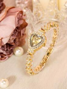 1 件女士时尚优雅石英腕表，金色表壳、表盘和表带，心形设计，百搭简约