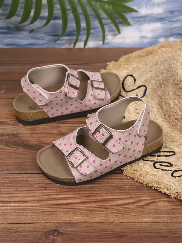 Nuevas sandalias planas de niña de moda para el verano, estilo lindo y dulce de lunares rosas, adecuadas para la playa, vacaciones y viajes