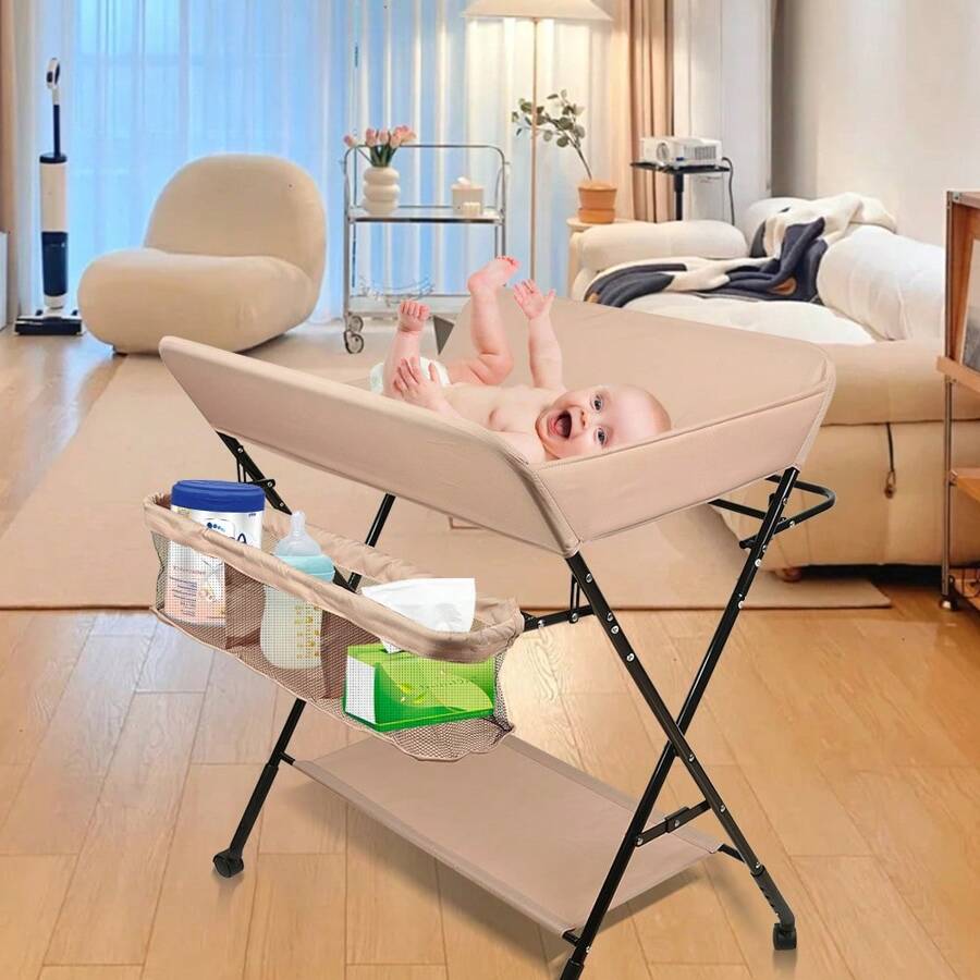 Cambiador de bebé, cambiador plegable, cambiador con cesto portaobjetos, cinturón de seguridad y 4 ruedas con freno, altura regulable 74 x 63 x 92-98 cm, apto para recién nacidos