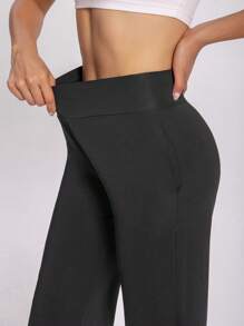 1 pièce Pantalon de sport décontracté pour femmes, nouveau pantalon d'été en couleur unie, respirant, avec une grande élasticité et un confort, longueur 7/8 fabriqué en tissu élastique avec design de taille croisée, convient pour la rue, le tennis, les loisirs, facile à enfiler et à enlever, pantalon de jogging pour enrichir votre vie