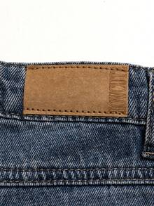 小男孩街头风格中度水洗可调节腰部破洞牛仔裤