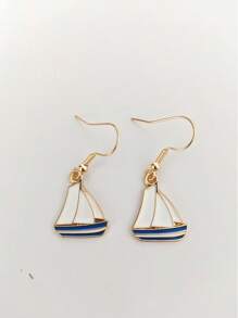 5 pares de pendientes con diseños inspirados en el mar: velero, ancla, salvavidas y faro