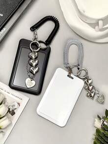 1个可扩展心形卡包钥匙扣，配有黑白心形吊坠，经久耐用，时尚设计，适合女性。可爱实用的塑料钥匙扣，校园必备，时尚钥匙扣配有金属心形吊坠，可收纳身份证、信用卡、交通卡和钥匙。 - 彩色 - 查看 2