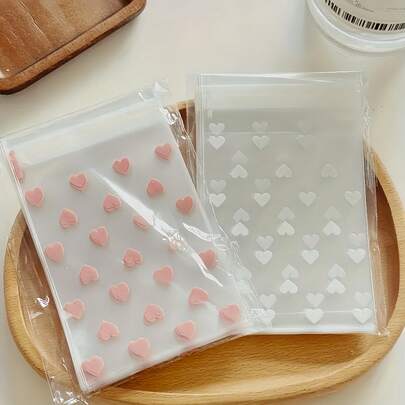 100pcs Creative Transparent Heart-Shaped Self-Adhesive Packaging Bags For Cookie S, Candies, And Desserts, Suitable For Gifts And Favor Packaging, Ideal Valentine's Day, Weddings, And Other Celebrations