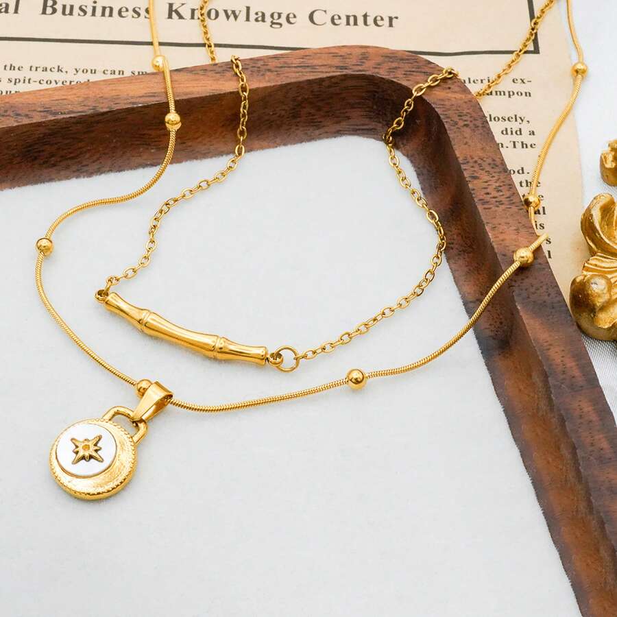 Elegante collar colgante de acero inoxidable chapado en oro de 18 quilates con perla de nácar en forma de octágono y nudos de bambú, de uso diario de alta gama para mujer