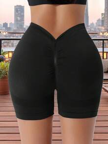 Pantalones cortos deportivos de color liso para mujer/sin costuras/cintura en V, shorts de yoga y gimnasio sexys que realzan el trasero - Negro - Ver 4
