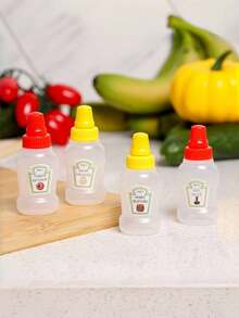 4PCS Condiment Squeeze Bottles, Ketchup Bottle, Salad Dressing Bottle, Mustard Bottle, Soy Sauce Bottle, Reusable Leakproof Portable, Kitchen Cooking, BBQ Seasoning, Picnic Essential, Camping Supplies, Food Lovers, Kitchen Storage, Practical Gadgets, Sauce Bottles, Condiment Dispenser, Dipping Sauce Bottle, Mini Condiment Bottles, Easy To Squeeze, Easy To Carry. - Multicolor - View 1