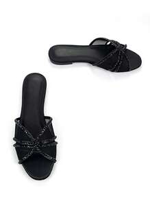 Sandales plates à brides femme élégantes, entièrement ornées de strass, avec décoration en maille ajourée noire. Bout rond confortable, convient pour le port quotidien et les soirées