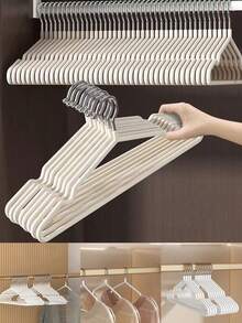 10/20 piezas Perchas de plástico versátiles sin recubrimiento con ranuras, ideales para organizar la ropa en dormitorios y hogares, perfectas para el secado de adultos, diseño ahorra espacio para una gestión eficiente del armario, esencial para la renovación estacional del armario, duraderas y ligeras para uso diario, mantenga su ropa ordenada y sin arrugas, perfectas para todo tipo de prendas, mejore la estética de su armario con estas perchas funcionales, imprescindibles para la organización de vuelta al colegio y las vacaciones.