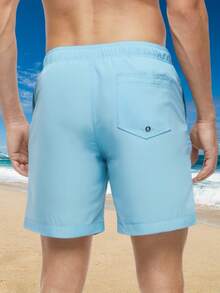 Pantalones de baño para hombres MADHERO con cintura con cordón y bolsillo en diagonal - Celeste - Ver 2