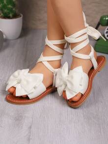 白色女童凉鞋一双，新款蝴蝶结公主鞋，松紧带设计，软底休闲沙滩鞋，夏季必备 - 米色 - 查看 2