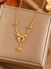 1 Peça Colar Pingente Coração em Forma de Laço de Aço Inoxidável, Colar Gargantilha Pingente Coração Laço Dourado Vintage Luxuoso, Presente Elegante para Meninas e Mulheres