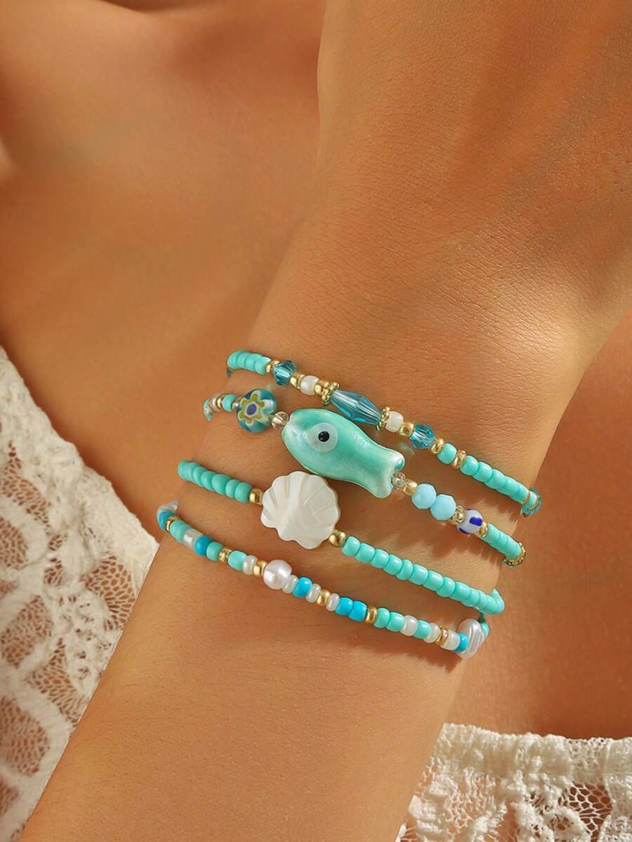 Set de 4 piezas de pulseras trenzadas con cuentas de conchas naturales y cerámica de peces en estilo vintage, aptas para mujer para uso diario, vacaciones y surf
