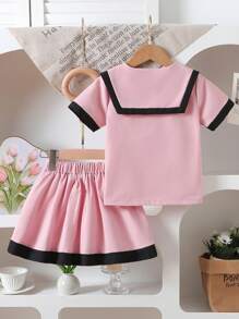 Set de 2 piezas de camisa de manga corta con botones y cuello marinero informal y falda para niñas