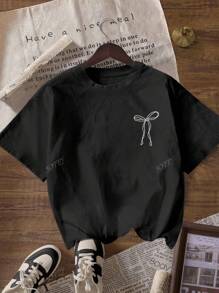 Camiseta de mujer de manga corta con cuello redondo, estampado de lema y lazo rosa